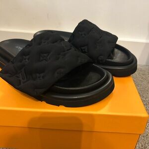 LV pool pillow slides